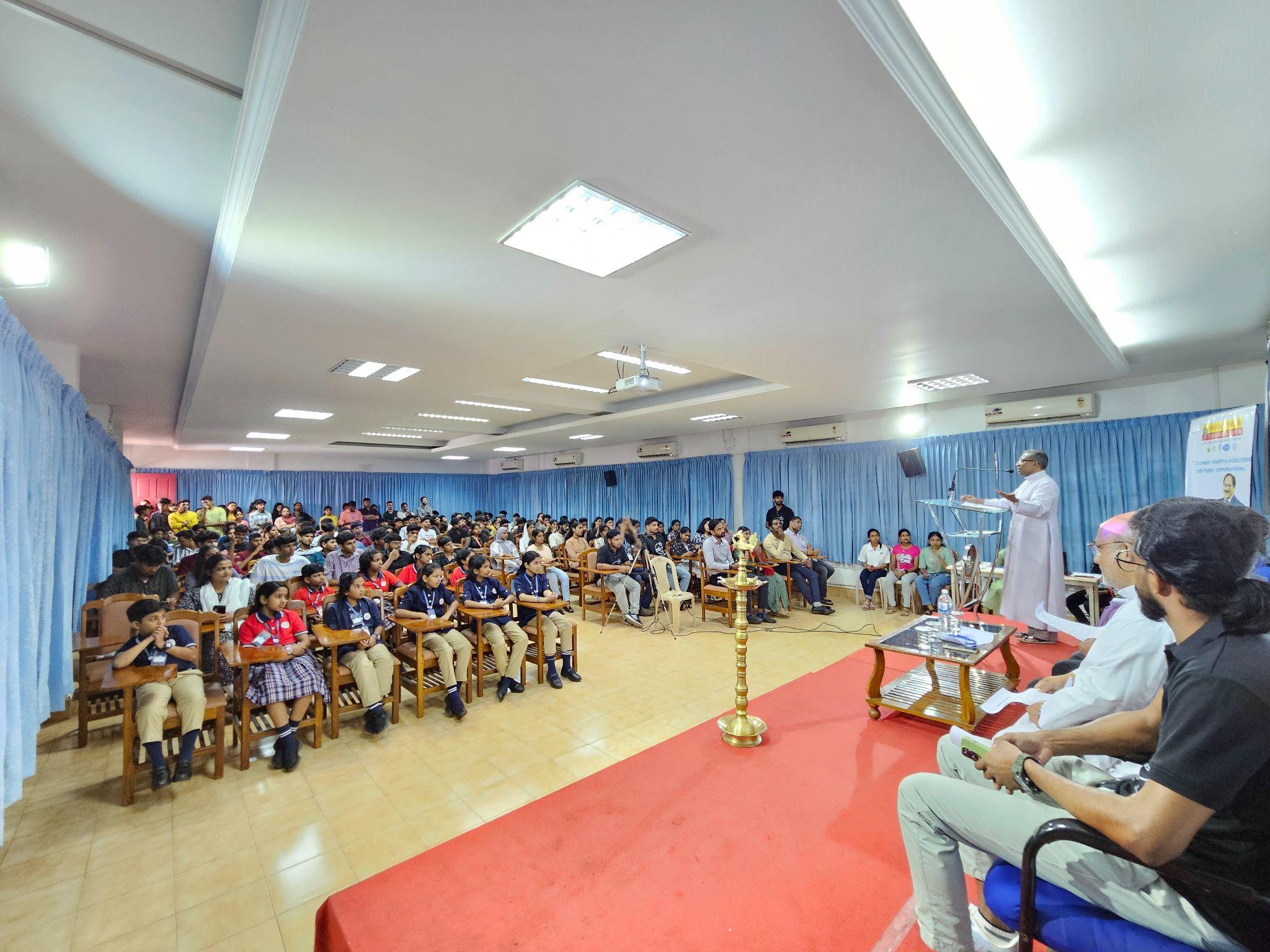 Students attending an indoor bootcamp briefing session